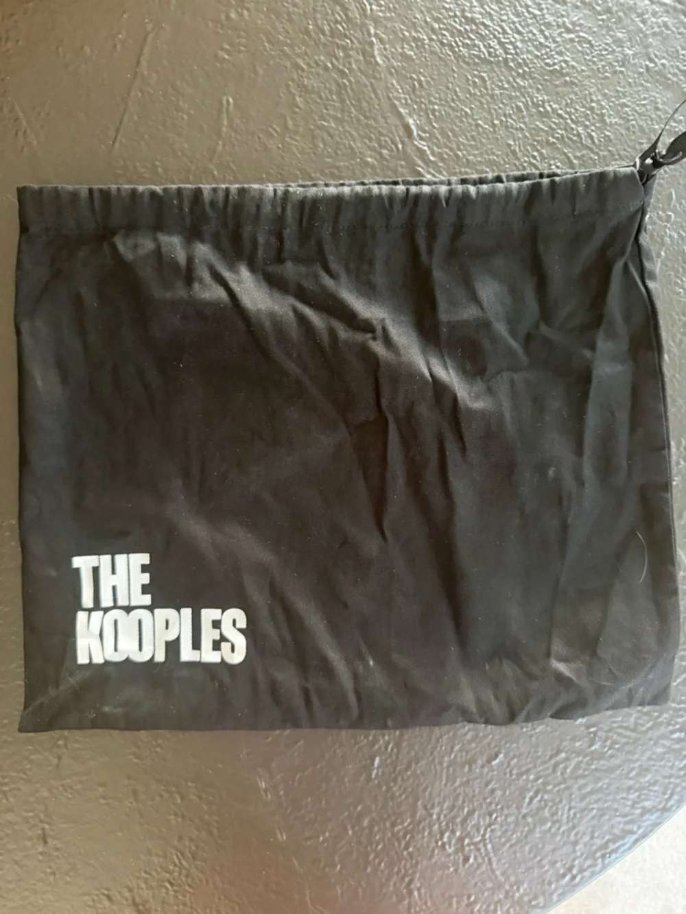 The Kooples “Small Emily” Studded Leather Crossbody Bag